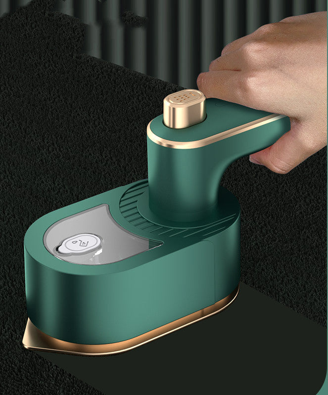 Compact folding garment steamer